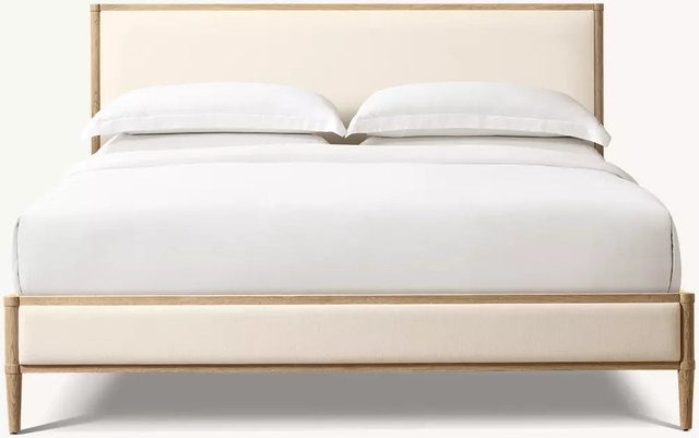 Кровать из массива дерева с тканевым покрытием